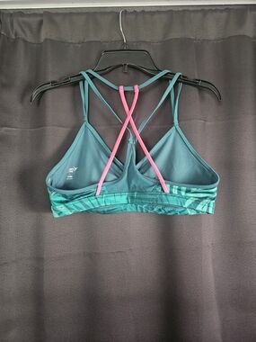 Old Navy Teal Sports Bra with Pink Crisscross Straps and Patterned Band